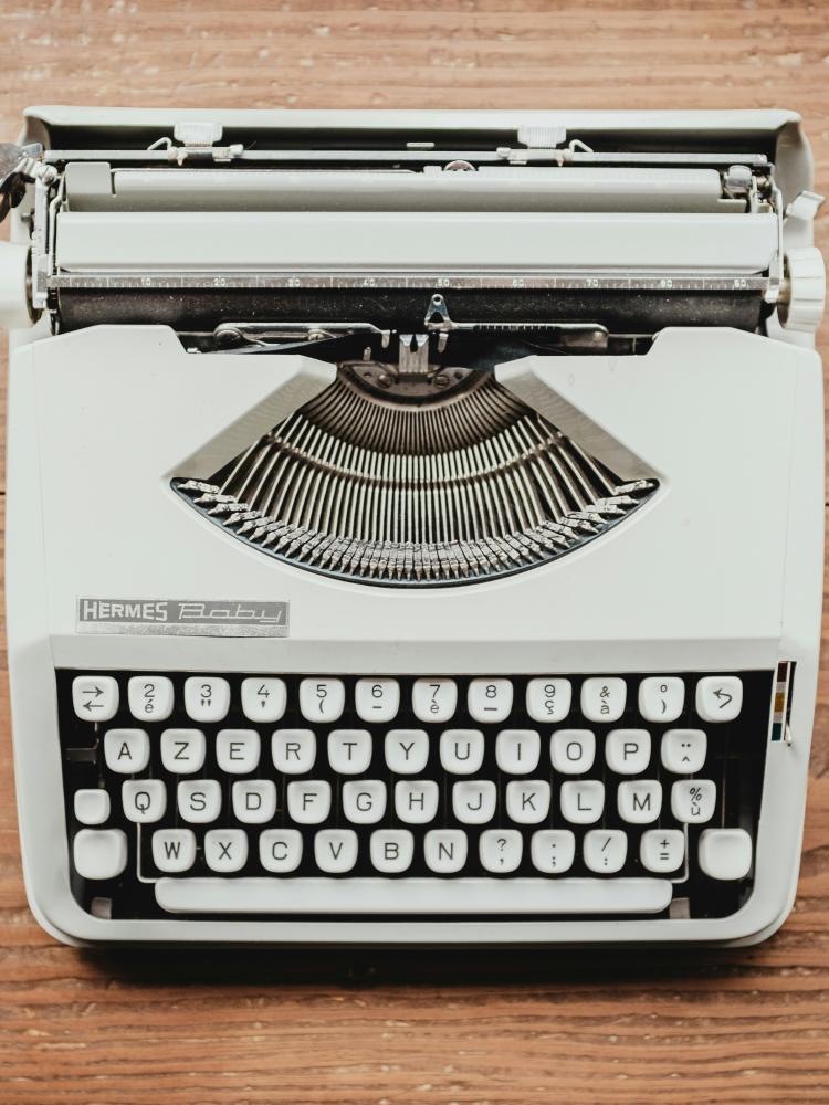 Photo by <a href="https://unsplash.com/@bernardhermant?utm_source=unsplash&utm_medium=referral&utm_content=creditCopyText">Bernard Hermant</a> on <a href="https://unsplash.com/photos/white-and-black-typewriter-on-table-qTpc0Vj4YoE?utm_source=unsplash&utm_medium=referral&utm_content=creditCopyText">Unsplash</a>       